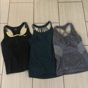 Three size medium workout tanks